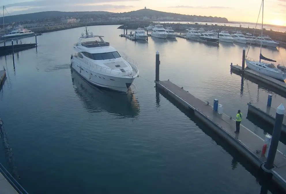 Marina berths with moored boats observed by an AI camera
