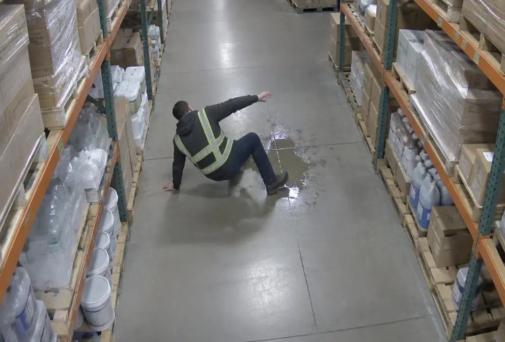 Person fallen on a warehouse floor detected by an AI camera
